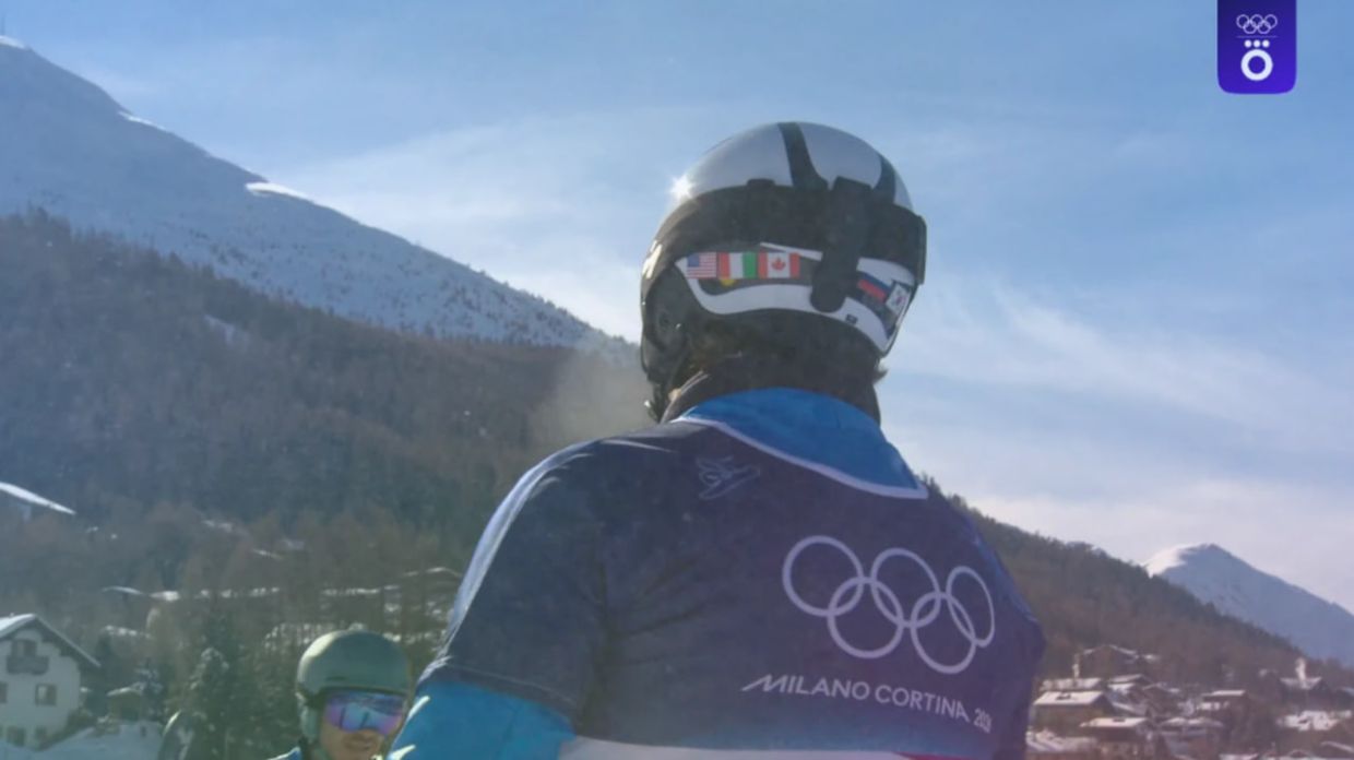 Роберт Фишналлер с флагом России на шлеме